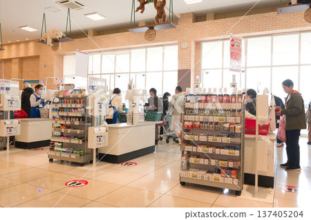 February: Housewives shopping at the supermarket February: Housewives shopping at the supermarket 137405204