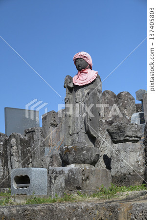 Dosojin statue with a blue sky in the background Dosojin statue with a blue sky in the background 137405803