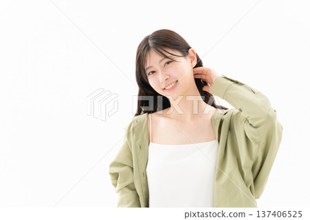 Beauty image of a woman doing skin care on a white background Beauty image of a woman doing skin care on a white background 137406525