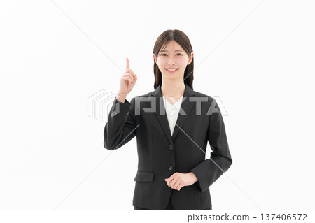 Young business woman with a white background Young business woman with a white background 137406572