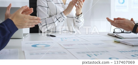 Business handshake agreement in modern office with financial documents, successful partnership deal, teamwork collaboration and corporate negotiation concept Business handshake agreement in modern office with financial documents, successful partnership deal, teamwork collaboration and corporate negotiation concept 137407069