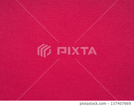 A vibrant magenta felt surface exudes a warm and tactile aesthetic 137407669