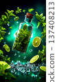 A bottle of mojito with lime and mint leaves falling out of it 137408213