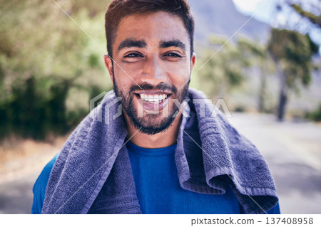 Portrait, fitness and smile of man in park with towel for break from exercise, workout and running marathon. Face, happy indian athlete and runner rest for sports, healthy training and cardio outdoor 137408958