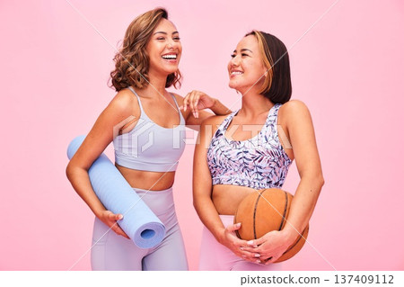 Friends, fitness and women on pink background for yoga, training and exercise with ball and yogi mat. Sports, happy and people in studio with gym equipment for wellness, workout and healthy body Friends, fitness and women on pink background for yoga, training and exercise with ball and yogi mat. Sports, happy and people in studio with gym equipment for wellness, workout and healthy body 137409112