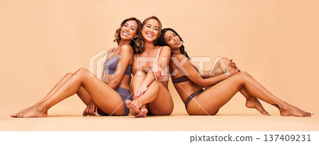 Beauty, group and happy women sitting with makeup for cosmetic skincare isolated in a studio brown background. Skin, aesthetic and portrait of friends together for self care, dermatology and support 137409231