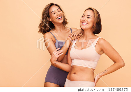 Beauty, diversity and friends with women in studio for health, skincare and cosmetics. Spa, self love and skincare with people on beige background for support, pride and solidarity on mockup 137409275