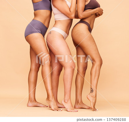 Legs, underwear and group of women in studio isolated on a brown background mockup space. Lingerie, friends and body positive models in empowerment inclusion, self love or health in wellness together 137409288