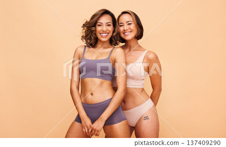 Beauty, body and smile with portrait of women in studio for health, diversity and cosmetics. Spa, self love and skincare with people on beige background for support, pride and solidarity on mockup 137409290