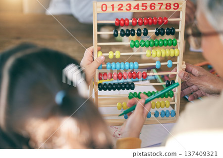 Kid, math homework or grandma teaching or helping for knowledge, education or child development. Grandparent, senior grandmother or back of girl counting numbers to study for test on abacus at home Kid, math homework or grandma teaching or helping for knowledge, education or child development. Grandparent, senior grandmother or back of girl counting numbers to study for test on abacus at home 137409321