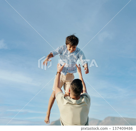 Dad, son and blue sky, playing together in summer and tropical island holiday on beach in Hawaii. Fun, father and and son on ocean vacation with airplane games to relax, trust and support in nature. 137409486