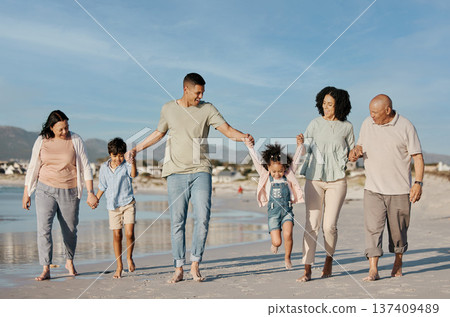 Walking, happy and family outdoor on a beach with love, care and happiness on travel vacation. Parents, grandparents or men and women holding hands of children for holiday, journey or fun adventure Walking, happy and family outdoor on a beach with love, care and happiness on travel vacation. Parents, grandparents or men and women holding hands of children for holiday, journey or fun adventure 137409489