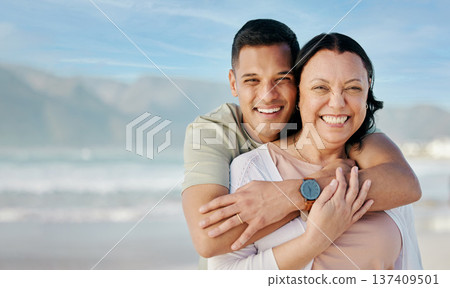Hug, portrait and couple at the beach with mockup for a date, vacation or bonding. Smile, care and a man and woman with love on a holiday at the sea with space for travel by the ocean for honeymoon Hug, portrait and couple at the beach with mockup for a date, vacation or bonding. Smile, care and a man and woman with love on a holiday at the sea with space for travel by the ocean for honeymoon 137409501