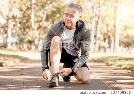 Senior man, tie shoelace and running, fitness and cardio in the park, start and health, wellness and vitality. Runner is ready for exercise, athlete and sports with sneakers, path outdoor and active Senior man, tie shoelace and running, fitness and cardio in the park, start and health, wellness and vitality. Runner is ready for exercise, athlete and sports with sneakers, path outdoor and active 137409538