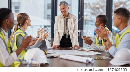 Applause, talking and construction workers in a meeting with a manager for architecture success. Happy, team and architects clapping for a presentation from a boss about infrastructure design 137409563