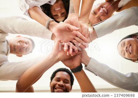 Office, team building and hands together from below in huddle for teamwork, collaboration and motivation at startup. Work, goals and diversity, group of people with business growth and staff support. Office, team building and hands together from below in huddle for teamwork, collaboration and motivation at startup. Work, goals and diversity, group of people with business growth and staff support. 137409698