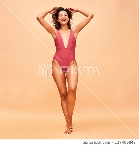 Summer, body and portrait with woman in swimsuit in studio for fashion, tropical and wellness. Beach, vacation and beauty with person on beige background for confident, holiday and self love mockup 137409842
