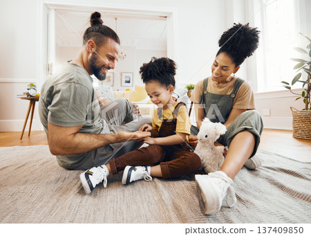 Happy family, bond and relax on a floor with care, fun and hand game in a home. Love, carpet and boy child with interracial parents in living room playing, learning and development together in house 137409850