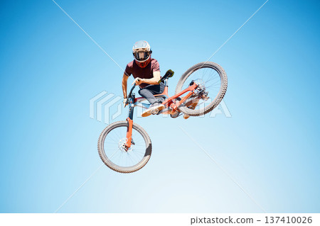 Cycling, sky and a man jump outdoor for sports, workout or training with skills and stunt. Athlete or cyclist with safety, wellness and fitness or performance space with balance and bicycle in air Cycling, sky and a man jump outdoor for sports, workout or training with skills and stunt. Athlete or cyclist with safety, wellness and fitness or performance space with balance and bicycle in air 137410026