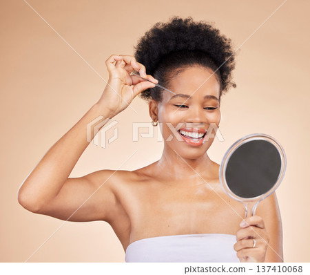 Woman, tweezers and mirror for eyebrow in studio, beauty or thinking for results, reflection or idea by background. African girl, model and smile for facial hair removal, inspection or transformation Woman, tweezers and mirror for eyebrow in studio, beauty or thinking for results, reflection or idea by background. African girl, model and smile for facial hair removal, inspection or transformation 137410068