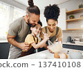 Child, mom and dad baking in kitchen, teaching and learning with happy support, development and breakfast. Smile, cooking and boy chef in home with happy parents, mixing bowl and eggs in the morning. 137410108