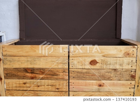 Sign, recycling and sustainability with a wooden box for paper, plastic or general waste disposal. Environment, green and nature conservation with a crate for an eco friendly campaign on earth day 137410193