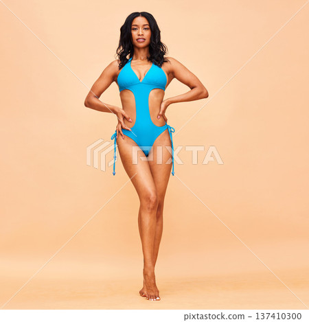 Beauty, fashion and swimsuit with portrait of woman in studio for summer, tropical and wellness. Beach, vacation and body with person on beige background for confident, holiday and self love style 137410300