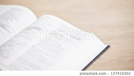 Closeup, bible or open book for faith, studying religion or healing with holy spiritual scripture. Christian literature, background or learning story for knowkedge education on God or Jesus Christ Closeup, bible or open book for faith, studying religion or healing with holy spiritual scripture. Christian literature, background or learning story for knowkedge education on God or Jesus Christ 137410302