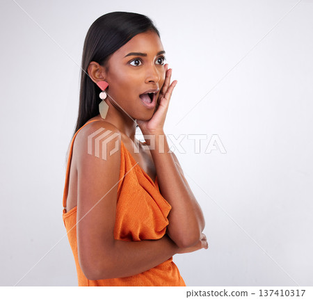 Wow, surprise and woman in studio for fashion, sale and news promotion on white background space. Emoji, face and Indian lady model shocked by announcement, deal or discount, prize or giveaway winner Wow, surprise and woman in studio for fashion, sale and news promotion on white background space. Emoji, face and Indian lady model shocked by announcement, deal or discount, prize or giveaway winner 137410317