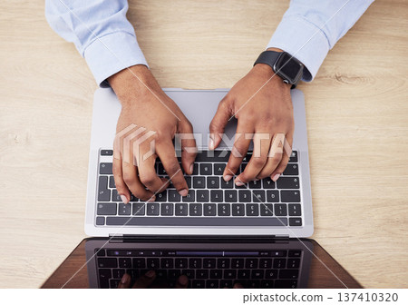 Laptop, above and hands of business person in office for networking, website and research. Cybersecurity, programming and worker on computer typing for information technology, coding software or data Laptop, above and hands of business person in office for networking, website and research. Cybersecurity, programming and worker on computer typing for information technology, coding software or data 137410320