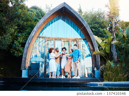 Garden lodge, glamping and friends cheers at a cabin with luxury accommodation and forest cottage. Travel, holiday and people relax at destination in Bali for vacation and freedom at resort pool Garden lodge, glamping and friends cheers at a cabin with luxury accommodation and forest cottage. Travel, holiday and people relax at destination in Bali for vacation and freedom at resort pool 137410346