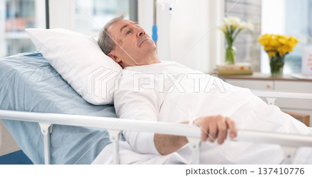 Man, cancer and patient in hospital bed thinking about healthcare, wellness and healing in clinic after surgery. Medical treatment, sick and person with health problem in hospice for recovery in icu Man, cancer and patient in hospital bed thinking about healthcare, wellness and healing in clinic after surgery. Medical treatment, sick and person with health problem in hospice for recovery in icu 137410776