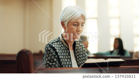 Bible, religion and a senior woman in a church for a sermon on faith or christian belief while sitting in a pew. Prayer, worship or reading with an elderly female person hearing about God and Jesus 137410811