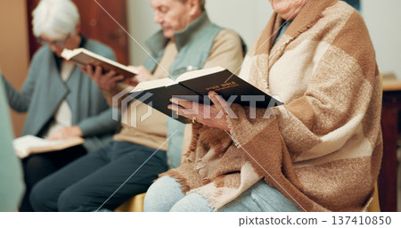 Praying, worship and hands of people in bible study for support, Christian and spiritual. Community, faith and religion with closeup of prayer group in church for connection, hope or meeting together 137410850