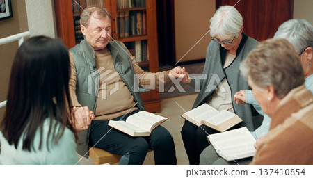 Praying, worship and holding hands with people in bible study for support, Christian and spiritual. Community, faith and religion with prayer group in church for connection, hope and meeting together 137410854