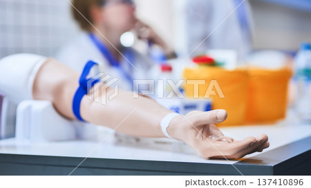 Medical training mannequin arm for phlebotomy education and blood draw practice Medical training mannequin arm for phlebotomy education and blood draw practice 137410896