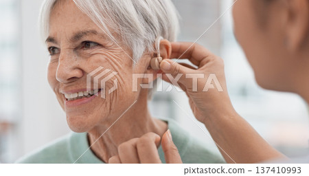Old woman, doctor hands and patient with hearing aid, help and support with healthcare in clinic. Person with disability, deaf and people, trust and communication, health insurance and medical 137410993