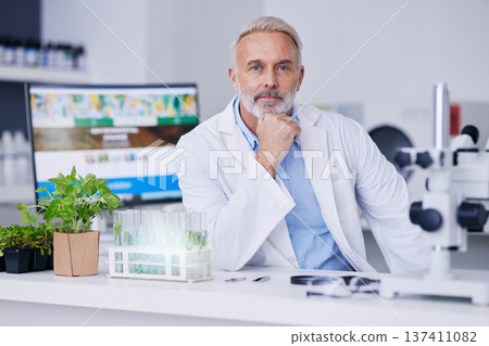 Portrait, mature scientist and man in laboratory for research, working and experiment of plants. Face, science doctor and medical professional studying food, gmo or leaf for healthcare in Canada. 137411082