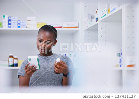 Pharmacy, medicine container or black woman choice, decision or reading pills label, bottle information or vitamin box. Hospital clinic, medical brand comparison or African client check drugs package Pharmacy, medicine container or black woman choice, decision or reading pills label, bottle information or vitamin box. Hospital clinic, medical brand comparison or African client check drugs package 137411127