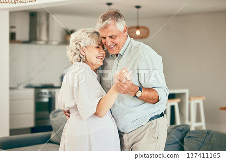 Holding hands, home or happy old couple dancing for love or trust in marriage at home together. Hug, romantic elderly man or senior woman bonding with smile or care in retirement or house living room Holding hands, home or happy old couple dancing for love or trust in marriage at home together. Hug, romantic elderly man or senior woman bonding with smile or care in retirement or house living room 137411165