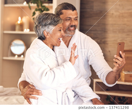Video call, wave and love with old couple in spa for anniversary, celebration and social media. Relax, massage and communication with senior man and woman in villa for luxury, vacation and peace 137411298