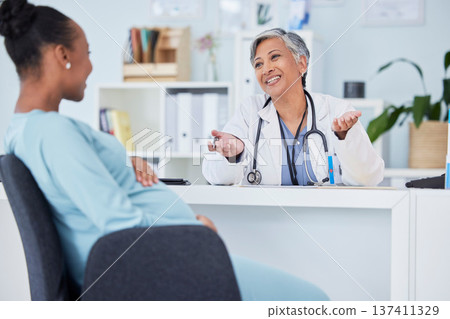 Doctor, pregnant patient and consultation, women in hospital office and communication with gynecology. Talking, maternal healthcare and pregnancy, medical advice and fertility with help and trust 137411329