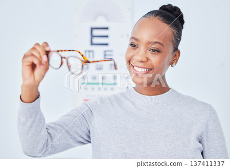 Eye care, glasses choice and patient, black woman is happy at clinic, optometry and frame with help and healthcare. Wellness, health and prescription lens, eyewear and decision with vision and smile 137411337