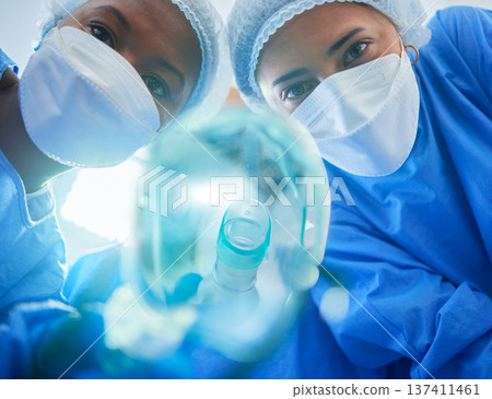 Surgery, anesthesia and doctors with oxygen mask for medical service, operation and procedure. Healthcare, hospital and portrait of surgeons with gas, breathing and ventilation equipment for patient 137411461