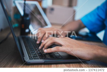 Hands, laptop and surveillance with a security guard in a CCTV room closeup to monitor criminal activity. Computer, safety and typing with an officer searching for evidence or information online Hands, laptop and surveillance with a security guard in a CCTV room closeup to monitor criminal activity. Computer, safety and typing with an officer searching for evidence or information online 137411472