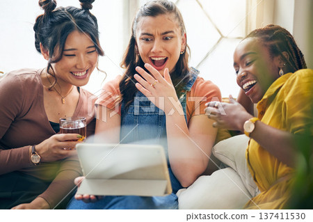 Home, friends and women with a tablet, funny and social media with connection, news and communication. Mobile app, group and female people with technology, laughing and online reading in a lounge Home, friends and women with a tablet, funny and social media with connection, news and communication. Mobile app, group and female people with technology, laughing and online reading in a lounge 137411530