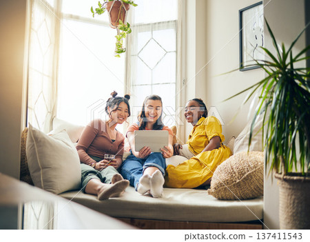 Home, friends and women with a tablet, connection or smile with live streaming, online reading or social media. App, group or happy people on a couch, technology or bonding with communication or chat Home, friends and women with a tablet, connection or smile with live streaming, online reading or social media. App, group or happy people on a couch, technology or bonding with communication or chat 137411543