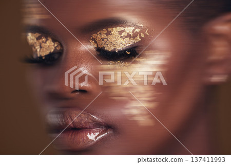 Gold beauty, blurred and black woman with face closeup with makeup and cosmetics in studio. Brown background, African female model and glitter with golden shine and glow from facial paint sparkle Gold beauty, blurred and black woman with face closeup with makeup and cosmetics in studio. Brown background, African female model and glitter with golden shine and glow from facial paint sparkle 137411993