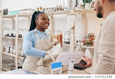 Sustainable shop, cashier and client with store purchase, woman and customer service with small business. Smile, entrepreneur and African person with retail employee and shopping with credit card 137412190