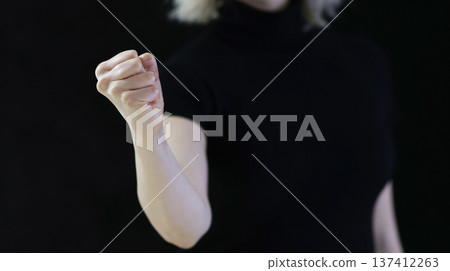Gesture, fist hand symbol means threat punishment or bullying Gesture, fist hand symbol means threat punishment or bullying 137412263
